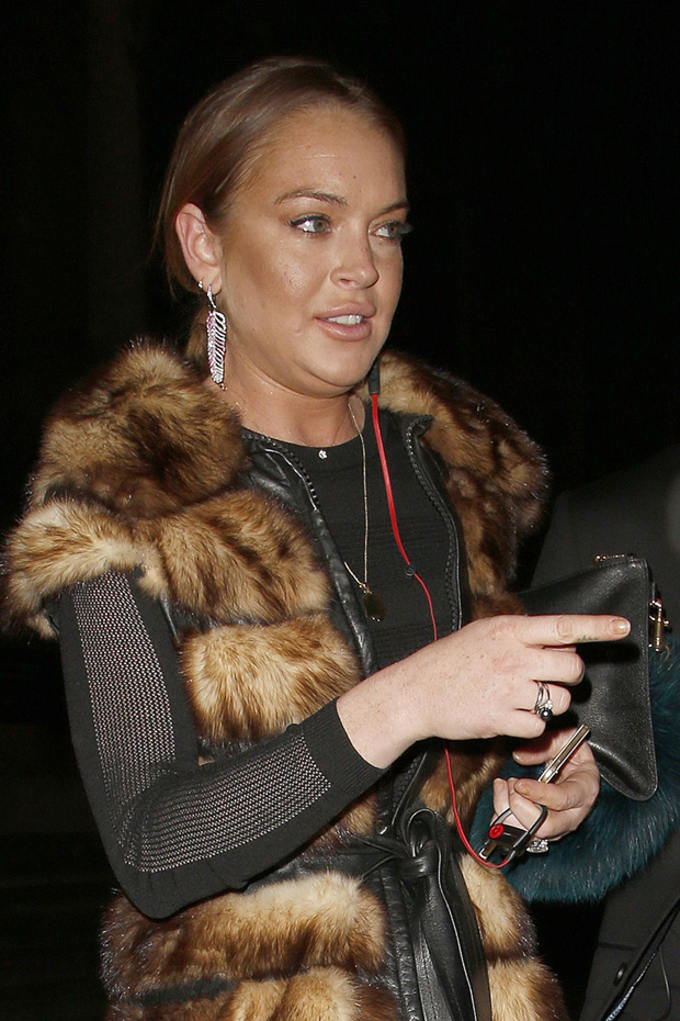 A Puffy Looking Faced Lindsay Lohan seen Leaving the V&A Fashion Show in London