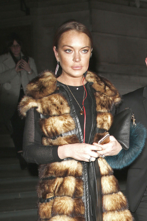 A Puffy Looking Faced Lindsay Lohan seen Leaving the V&A Fashion Show in London
