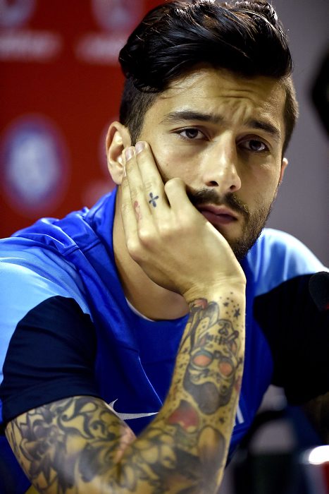 Greece's midfielder Panagiotis Kone attends a press conference in Aracaju on June 15, 2014, during the 2014 FIFA World Cup. Greece faces Colombia, Japan and Ivory Coast on group C. AFP PHOTO / ARIS MESSINIS