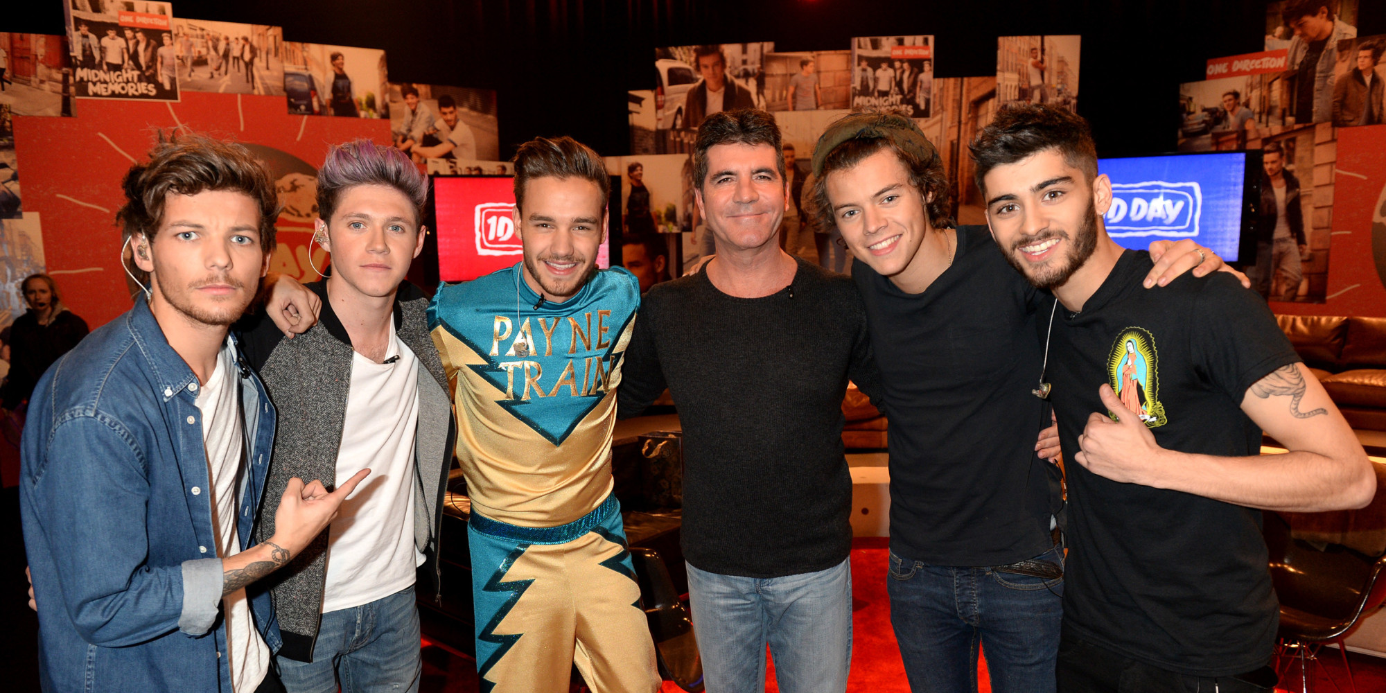 PLAYA VISTA, CA - NOVEMBER 23:  (L-R) Louis Tomlinson, Niall Horan, Liam Payne, Simon Cowell, Harry Styles, and Zayn Malik on set during One Direction celebrates 1D Day at YouTube Space LA, a 7-hour livestream event broadcast exclusively on YouTube and Google+. Featuring behind the scenes footage, Guinness world record attempts, and amazing special guests, the global event also marked the premiere of tracks from their new album 'Midnight Memories', set for release November 25th, in Playa Vista, California on November 23, 2013  (Photo by Jeff Kravitz/FilmMagic)