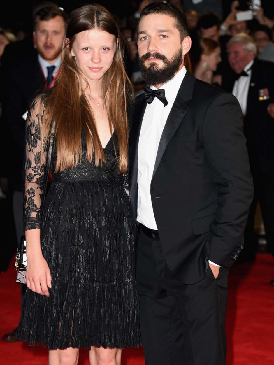 LONDON, ENGLAND - OCTOBER 19:  Mia Goth and actor Shia LeBeouf attend the closing night European Premiere gala red carpet arrivals for "Fury" during the 58th BFI London Film Festival at Odeon Leicester Square on October 19, 2014 in London, England.  (Photo by Gareth Cattermole/Getty Images for BFI)