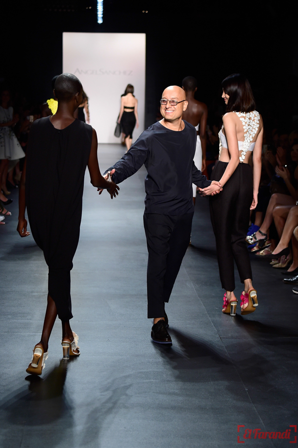 NEW YORK, NY - SEPTEMBER 15: Designer Angel Sanchez (C) greets the audience on the runway with models wearing Angel Sanchez Spring 2016 during New York Fashion Week: The Shows at The Dock, Skylight at Moynihan Station on September 15, 2015 in New York City.   Frazer Harrison/Getty Images for NYFW: The Shows/AFP