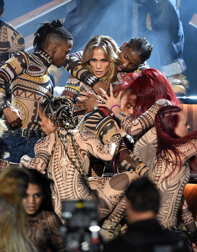 LOS ANGELES, CA - NOVEMBER 22: Host Jennifer Lopez performs onstage during the 2015 American Music Awards at Microsoft Theater on November 22, 2015 in Los Angeles, California. Kevin Winter/Getty Images/AFP