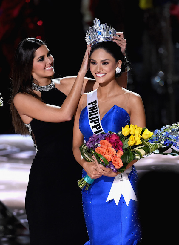 LAS VEGAS, NV - DECEMBER 20:  Miss Philippines 2015, Pia Alonzo Wurtzbach (R), reacts as she is crowned the 2015 Miss Universe by Miss Universe 2014 Paulina Vega (L) during the 2015 Miss Universe Pageant at The Axis at Planet Hollywood Resort & Casino on December 20, 2015 in Las Vegas, Nevada. Miss Colombia 2015, Ariadna Gutierrez (not pictured), was mistakenly named as Miss Universe 2015 instead of first runner-up.  (Photo by Ethan Miller/Getty Images)