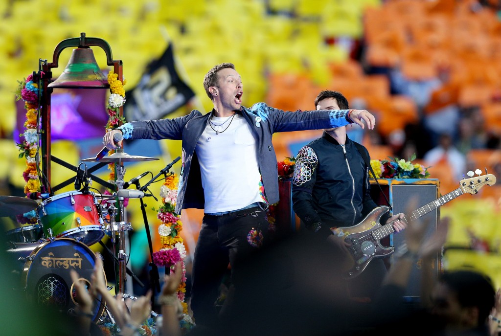 SANTA CLARA, CA - FEBRUARY 07: Chris Martin of Coldplay performs during the Pepsi Super Bowl 50 Halftime Show at Levi's Stadium on February 7, 2016 in Santa Clara, California. Patrick Smith/Getty Images/AFP