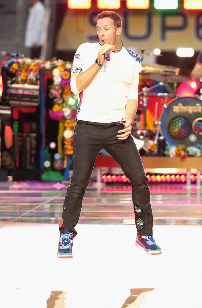 SANTA CLARA, CA - FEBRUARY 07: Chris Martin of Coldplay performs onstage during the Pepsi Super Bowl 50 Halftime Show at Levi's Stadium on February 7, 2016 in Santa Clara, California. Christopher Polk/Getty Images/AFP