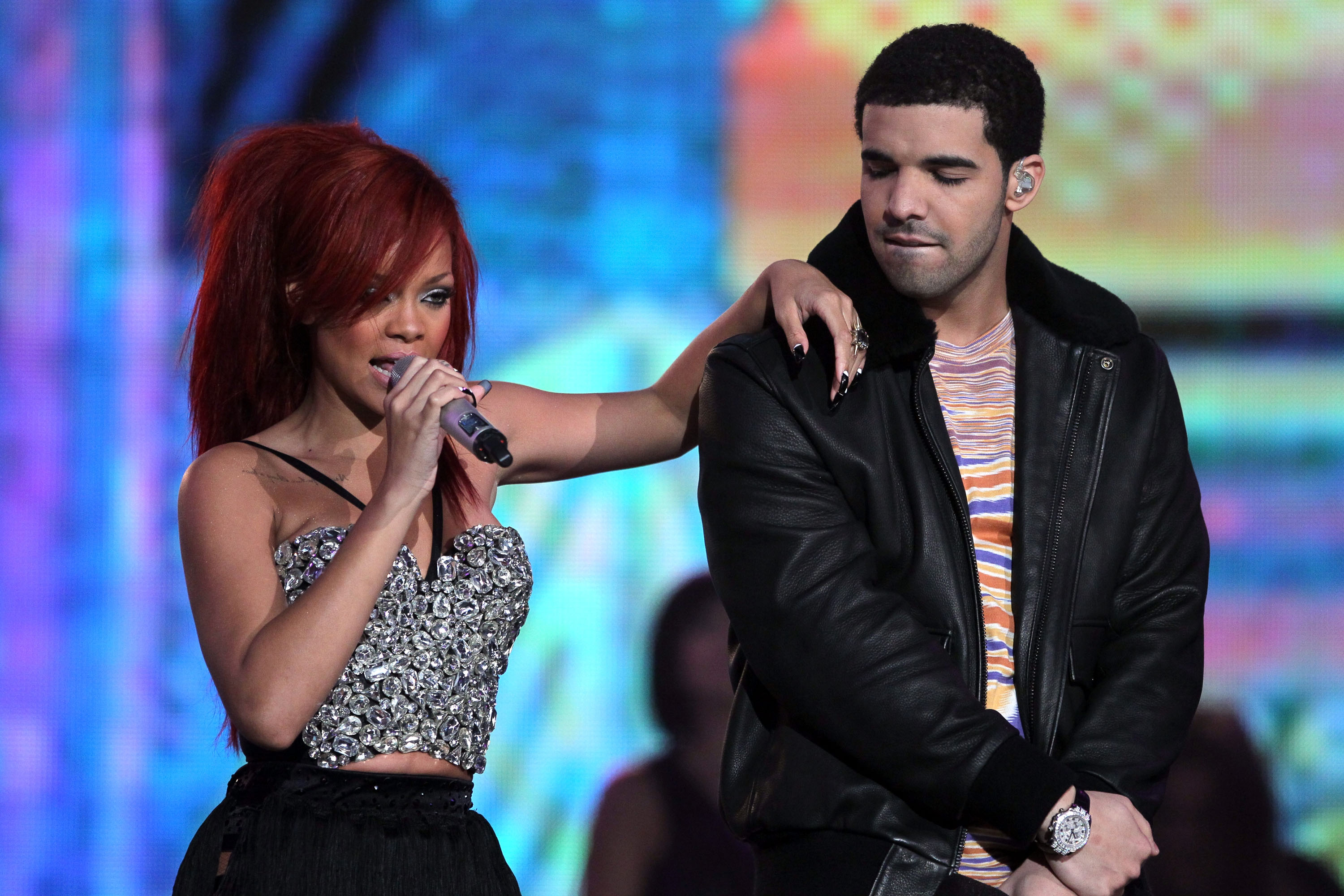 LOS ANGELES, CA - FEBRUARY 20: Singer Rihanna (L) and rapper Drake perform during the 2011 NBA All-Star game halftime show at Staples Center on February 20, 2011 in Los Angeles, California. NOTE TO USER: User expressly acknowledges and agrees that, by downloading and or using this photograph, User is consenting to the terms and conditions of the Getty Images License Agreement. (Photo by Jeff Gross/Getty Images)