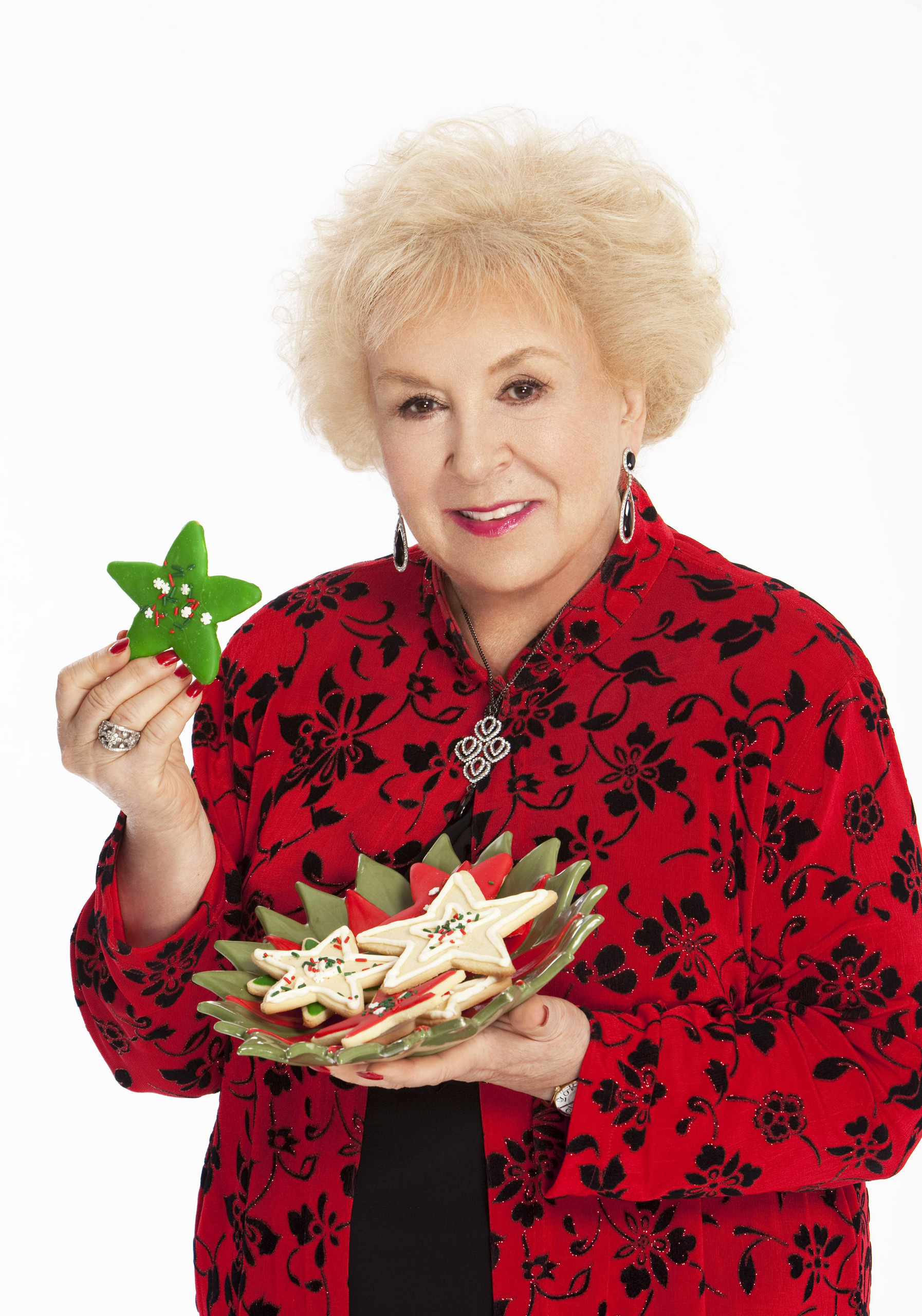 Doris Roberts reprises her role as the loveable Mrs. Emily Merkle, whose magical spirit brings nothing short of miracles to new friends who are struggling during the holiday season. Photo:   Copyright 2010 Crown Media Holdings, Inc./Photographer Eike Schroter