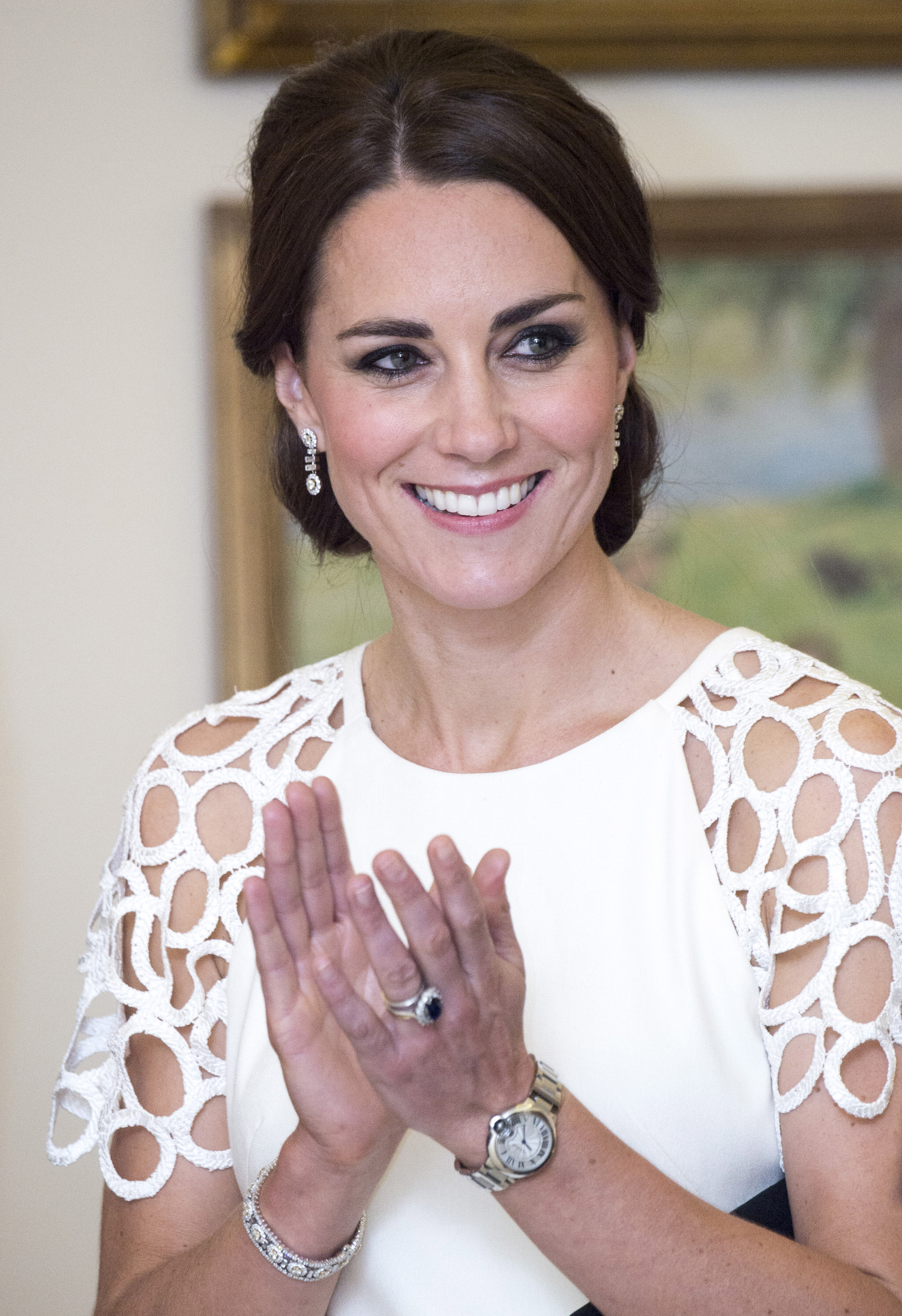CANBERRA, AUSTRALIA - APRIL 24: Catherine, Duchess of Cambridge is seen as she attends a reception hosted by the Governor General Peter Cosgrove and Her excellency Lady Cosgrove at Government House on April 24, 2014 in Canberra, Australia. The Duke and Duchess of Cambridge are on a three-week tour of Australia and New Zealand, the first official trip overseas with their son, Prince George of Cambridge. (Photo by Arthur Edwards - Pool/Getty Images)