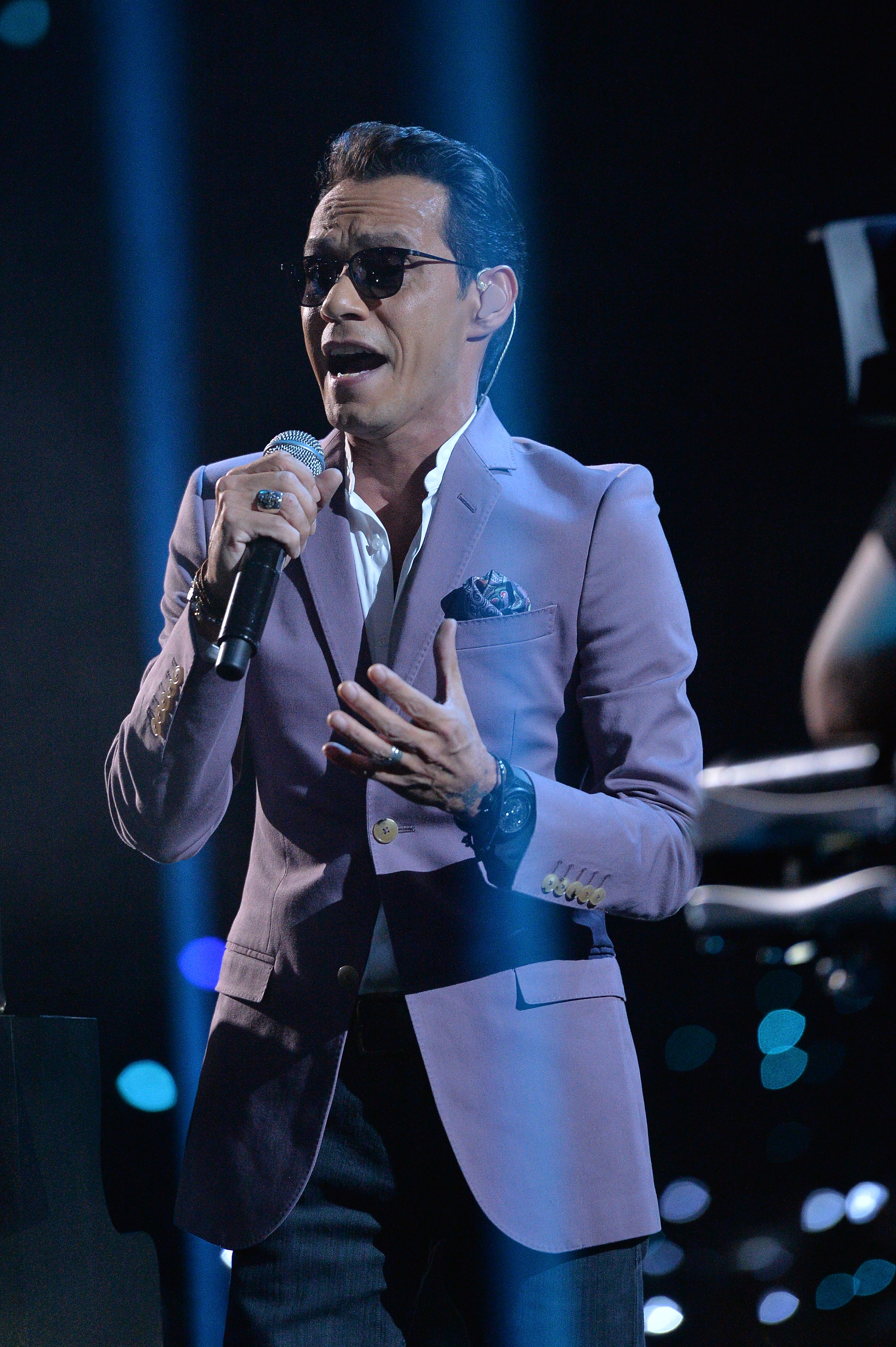 MIAMI, FL - JULY 14: Marc Anthony performs onstage at the Univision's 13th Edition Of Premios Juventud Youth Awards at Bank United Center on July 14, 2016 in Miami, Florida. Rodrigo Varela/Getty Images for Univision/AFP