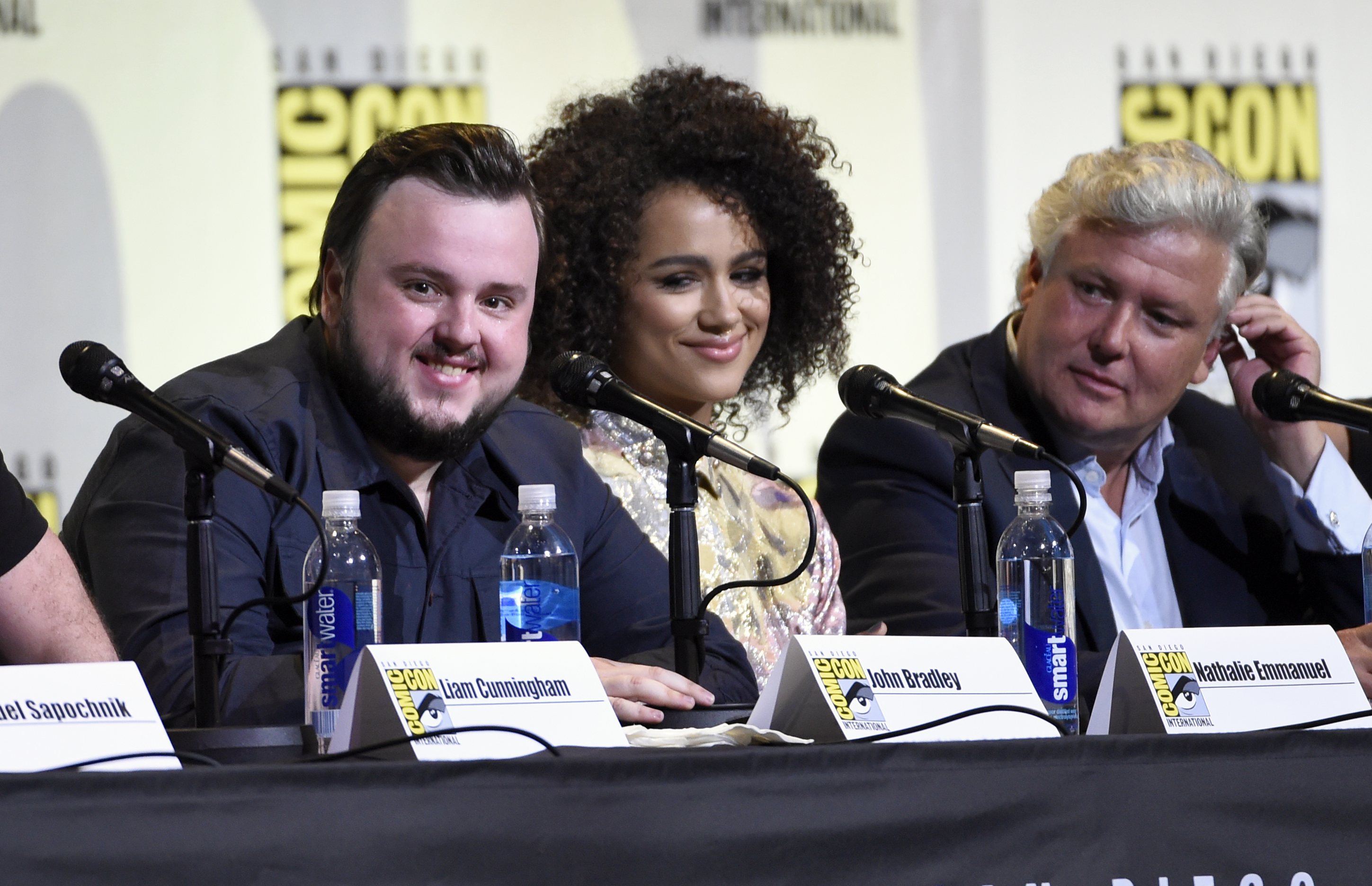 John Bradley, from left, Nathalie Emmanuel and Conleth Hill attend the "Game of Thrones" panel on day 2 of Comic-Con International on Friday, July 22, 2016, in San Diego. (Photo by Chris Pizzello/Invision/AP)