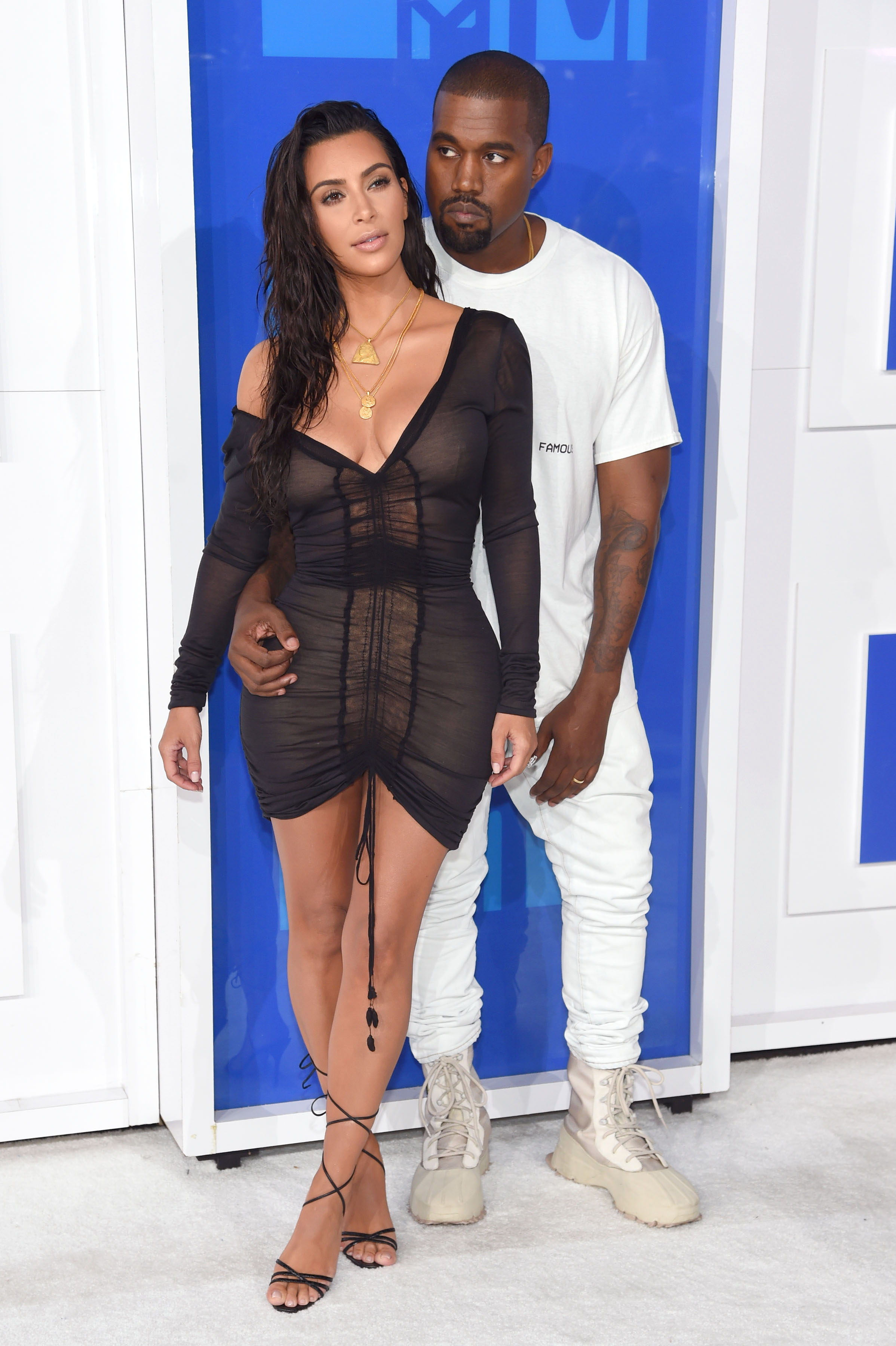 NEW YORK, NY - AUGUST 28: Kanye West and Kim Kardashian West attend the 2016 MTV Video Music Awards at Madison Square Garden on August 28, 2016 in New York City. Jamie McCarthy/Getty Images/AFP