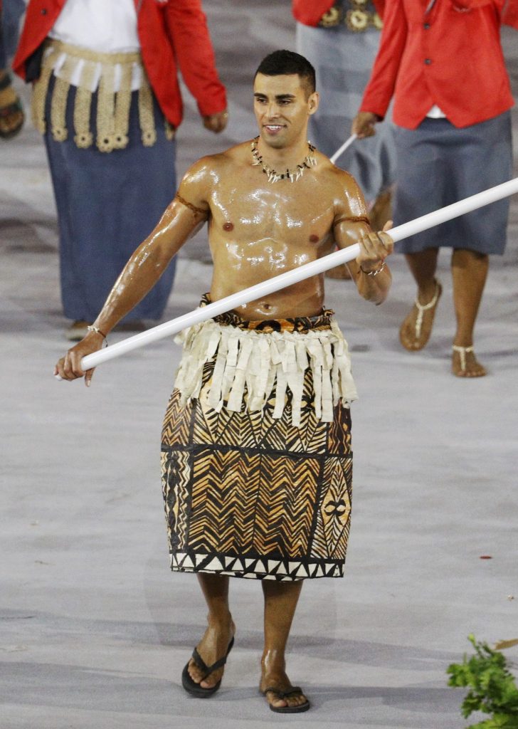 2016 Rio Olympics - Opening ceremony - Maracana - Rio de Janeiro, Brazil - 05/08/2016.Flagbearer Pita Nikolas Taufatofua (TGA) of Tonga leads his contingent during the athletes' parade at the opening ceremony.  REUTERS/Stoyan Nenov FOR EDITORIAL USE ONLY. NOT FOR SALE FOR MARKETING OR ADVERTISING CAMPAIGNS.