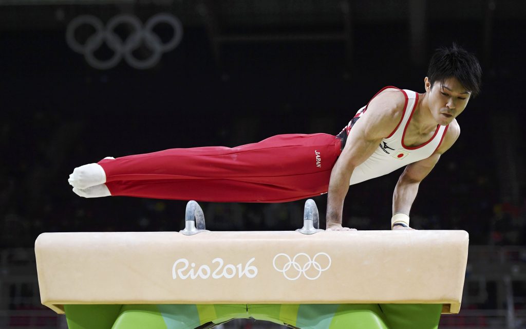 2016 Rio Olympics - Artistic Gymnastics - Preliminary - Men's Qualification - Subdivisions - Rio Olympic Arena - Rio de Janeiro, Brazil - 06/08/2016. Kohei Uchimura (JPN) of Japan competes on the pommel horse. REUTERS/Dylan Martinez FOR EDITORIAL USE ONLY. NOT FOR SALE FOR MARKETING OR ADVERTISING CAMPAIGNS.