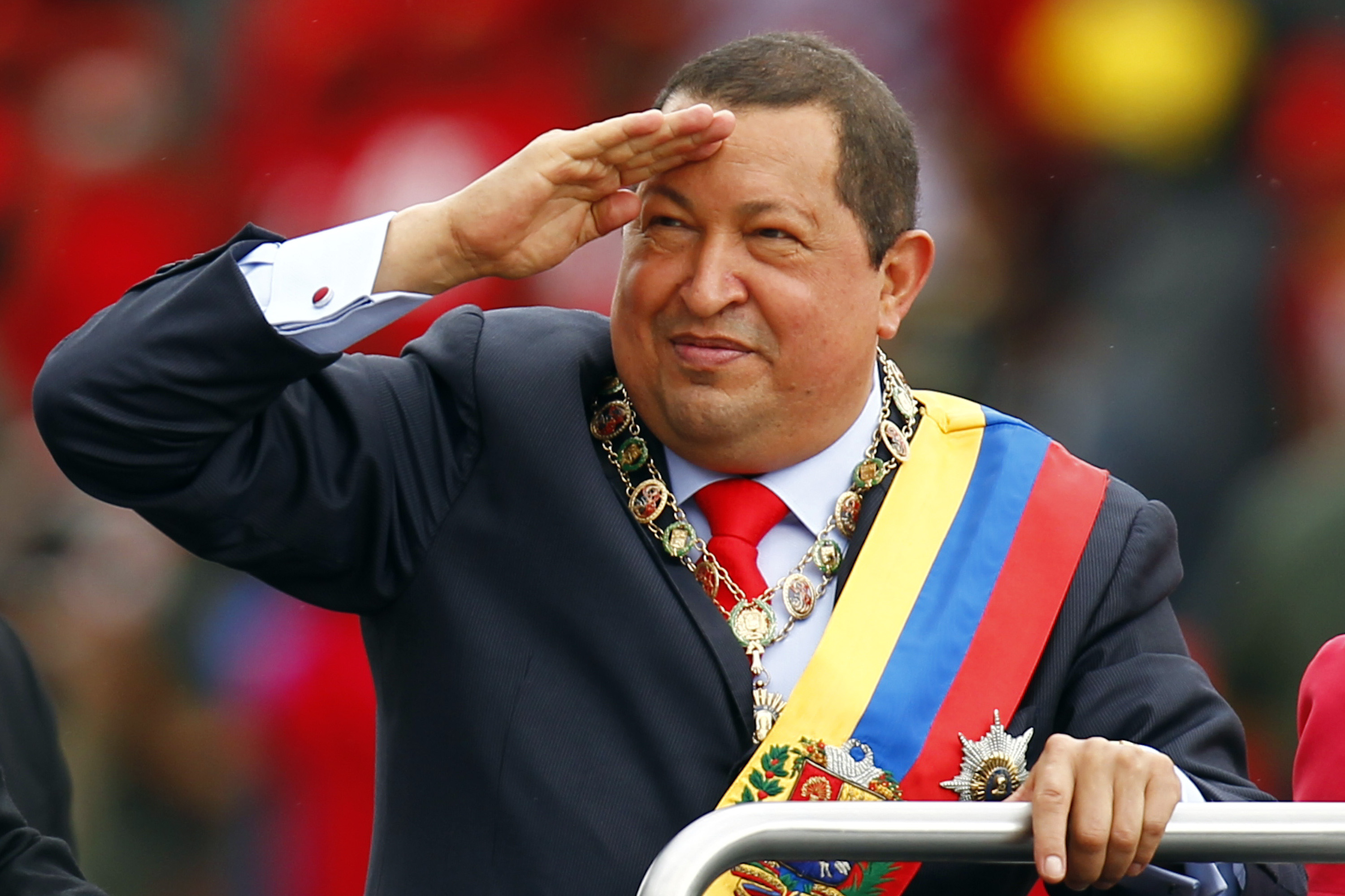 Venezuelan President Hugo Chavez arrives at a military parade to commemorate the 20th anniversary of his failed coup attempt in Caracas February 4, 2012. REUTERS/Jorge Silva (VENEZUELA - Tags: POLITICS) - RTR2XBKY