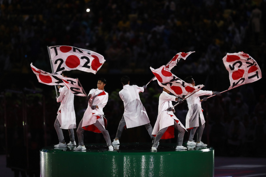 RIO DE JANEIRO, BRAZIL - AUGUST 21: Dancers perform at the 'Love Sport Tokyo 2020' segment during the Closing Ceremony on Day 16 of the Rio 2016 Olympic Games at Maracana Stadium on August 21, 2016 in Rio de Janeiro, Brazil. (Photo by Alexander Hassenstein/Getty Images)