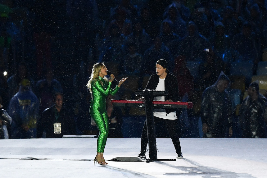 RIO DE JANEIRO, BRAZIL - AUGUST 21: Electronic music artist Kygo and singer-songwriter Julia Michaels perform the song "Carry Me" during the Closing Ceremony on Day 16 of the Rio 2016 Olympic Games at Maracana Stadium on August 21, 2016 in Rio de Janeiro, Brazil. (Photo by Pascal Le Segretain/Getty Images)