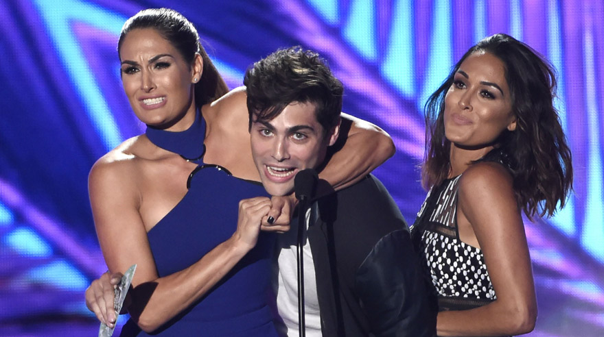 Nikki Bella, from left, Matthew Daddario and Brie Bella present the award for choice movie: breakout star at the Teen Choice Awards at the Forum on Sunday, July 31, 2016, in Inglewood, Calif. (Photo by Chris Pizzello/Invision/AP)