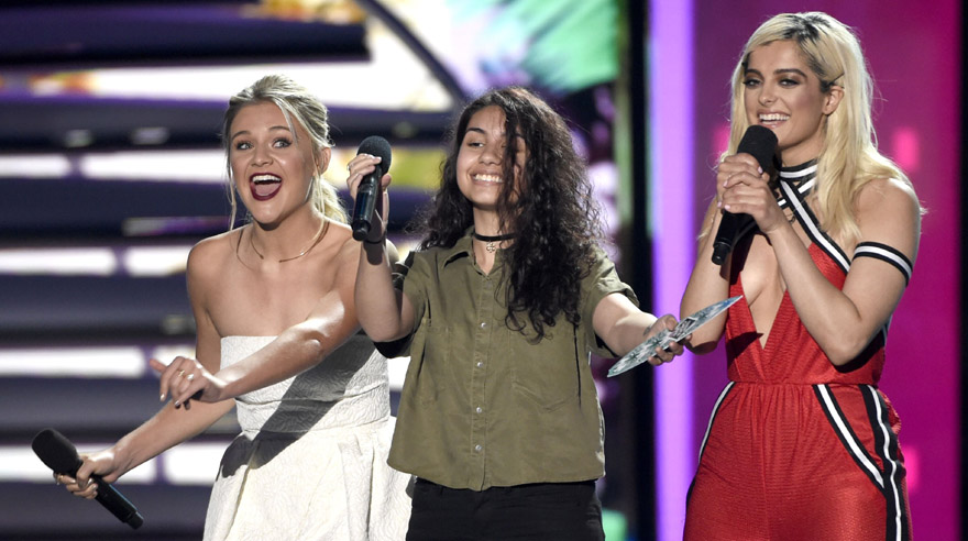 Kelsea Ballerini, from left, Alessia Cara and Bebe Rexha present the award for choice TV actor: sci-fi/fantasy at the Teen Choice Awards at the Forum on Sunday, July 31, 2016, in Inglewood, Calif. (Photo by Chris Pizzello/Invision/AP)