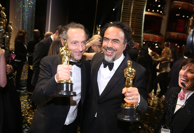 Emmanuel Lubezki, winner of the award for best cinematography for “The Revenant”, left, and Alejandro G. Inarritu, winner of the award for best director for “The Revenant”, appear backstage at the Oscars on Sunday, Feb. 28, 2016, at the Dolby Theatre in Los Angeles. (Photo by Matt Sayles/Invision/AP)