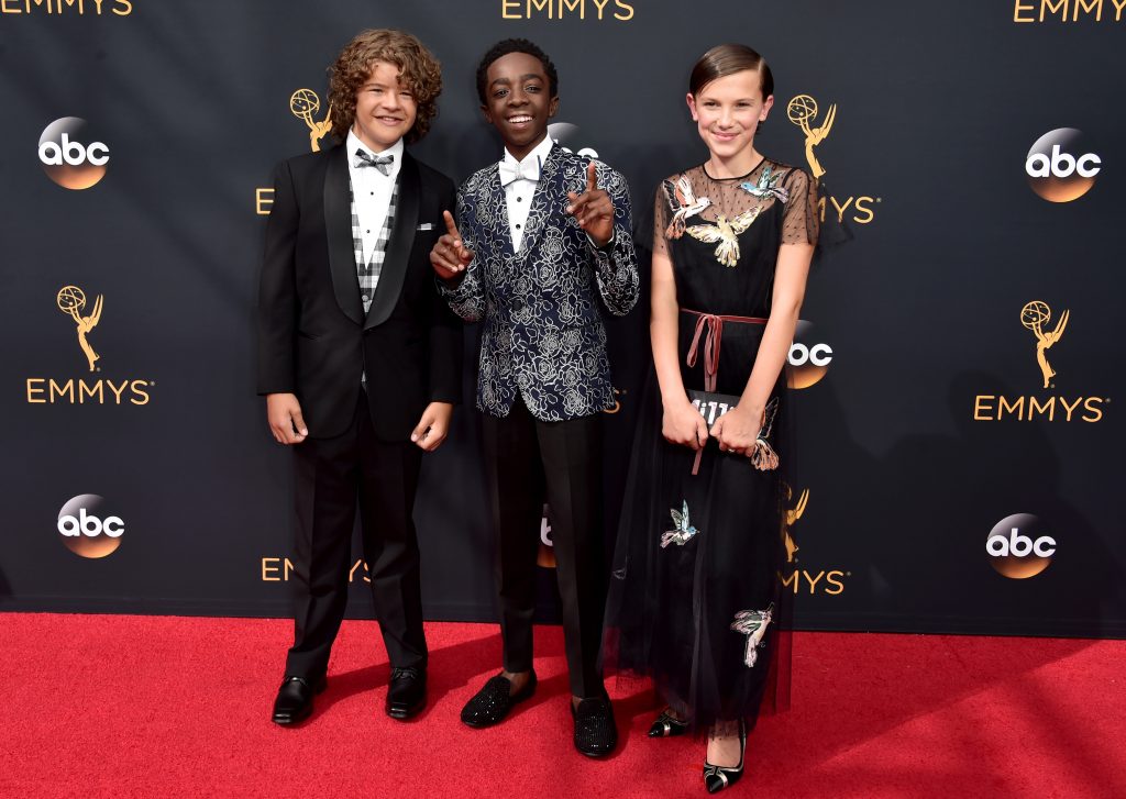 LOS ANGELES, CA - SEPTEMBER 18: (L-R) Actors Gaten Matarazzo, Caleb McLaughlin and Millie Bobby Brown attend the 68th Annual Primetime Emmy Awards at Microsoft Theater on September 18, 2016 in Los Angeles, California.   Alberto E. Rodriguez/Getty Images/AFP