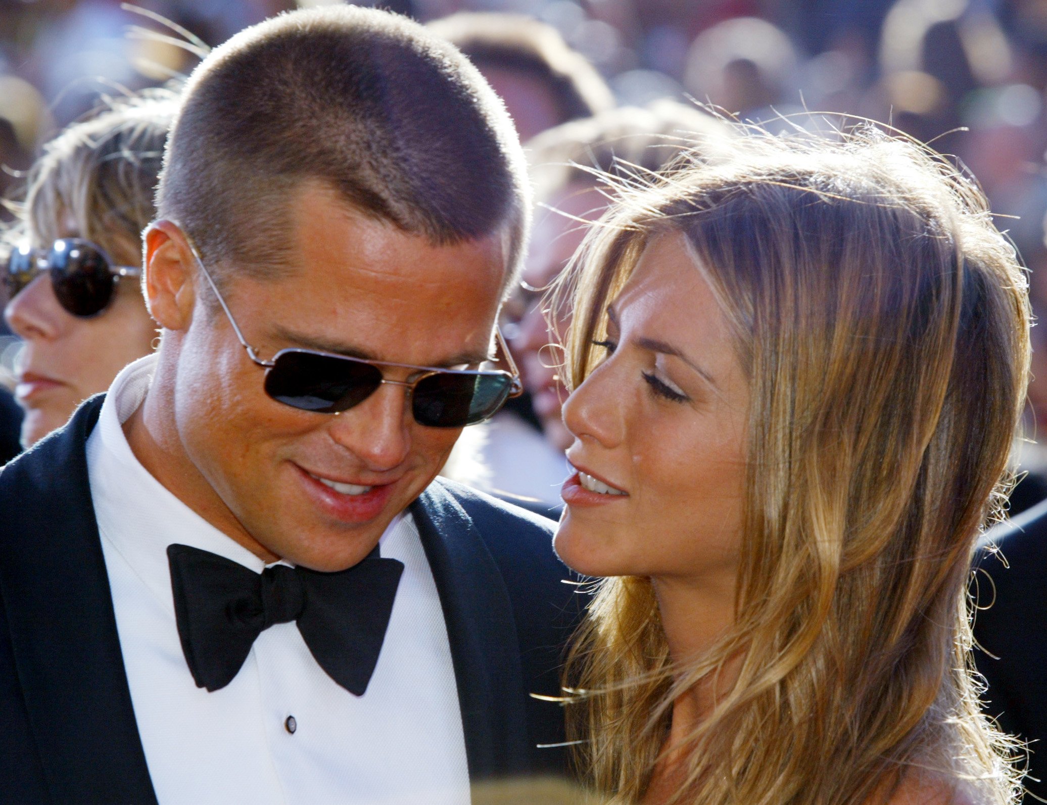 Brad Pitt and Jennifer Aniston arrive at the 56th annual Primetime Emmy Awards at the Shrine Auditorium in Los Angeles, in this September 19, 2004 file photo. Jennifer Aniston filed for divorce on March 25, 2005 from Brad Pitt, some two and a half months after Hollywood's golden couple announced they were separating, court papers in Los Angeles showed. REUTERS/Kimberly White/Files SV/PN - RTR6400