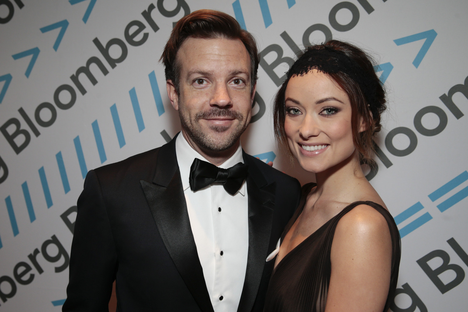 Actress Olivia Wilde and actor Jason Sudeikis attend the Bloomberg cocktail party before the White House Correspondents' Association (WHCA) dinner in Washington, D.C., U.S., on Saturday, April 27, 2013. The 99th annual dinner raises money for WHCA scholarships and honors the recipients of the organization's journalism awards. Photographer: Andrew Harrer/Bloomberg via Getty Images