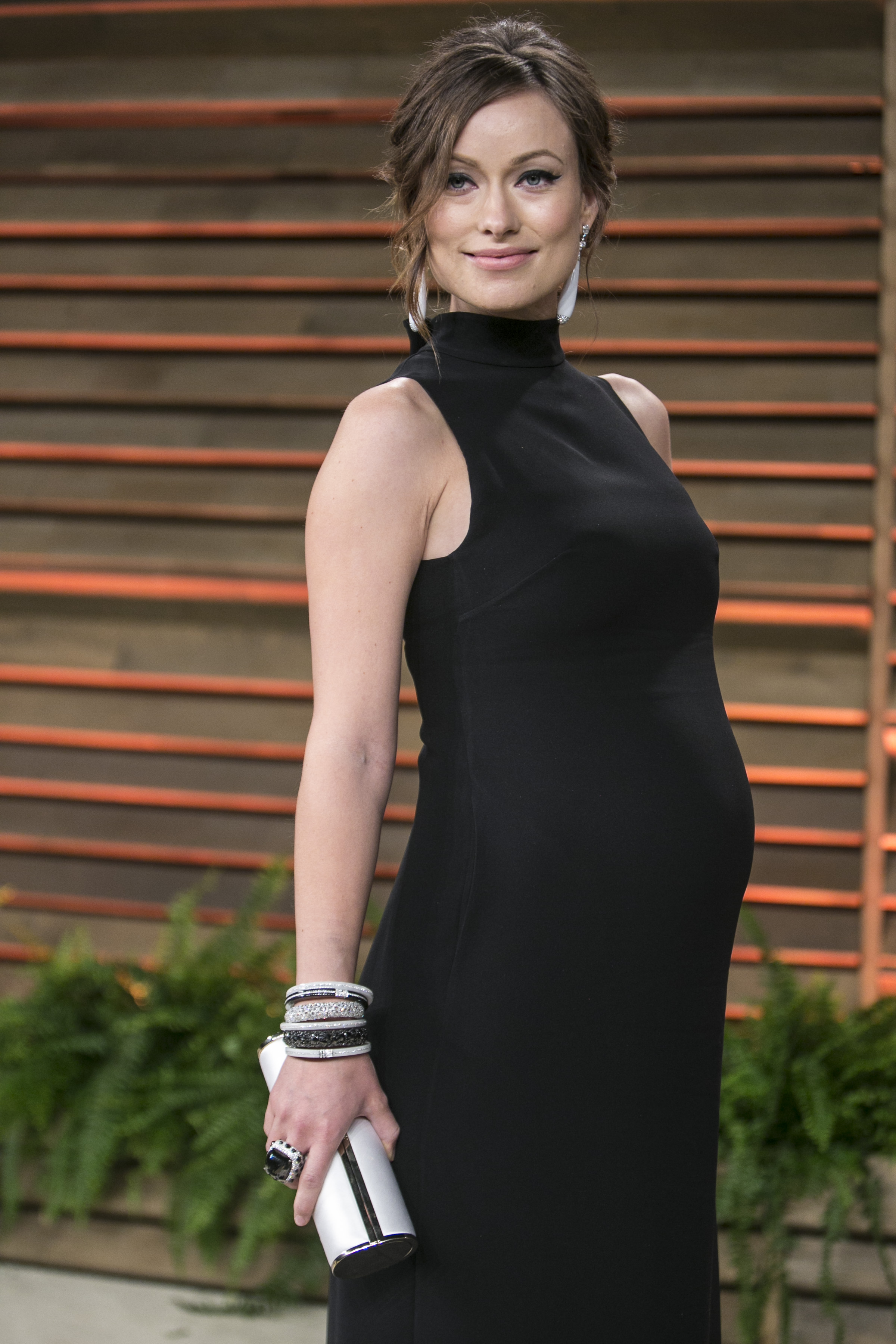 Olivia Wilde arrives at the 2014 Vanity Fair Oscar Party on March 2, 2014 in West Hollywood, California. AFP PHOTO/ADRIAN SANCHEZ-GONZALEZ (Photo credit should read ADRIAN SANCHEZ-GONZALEZ/AFP/Getty Images)