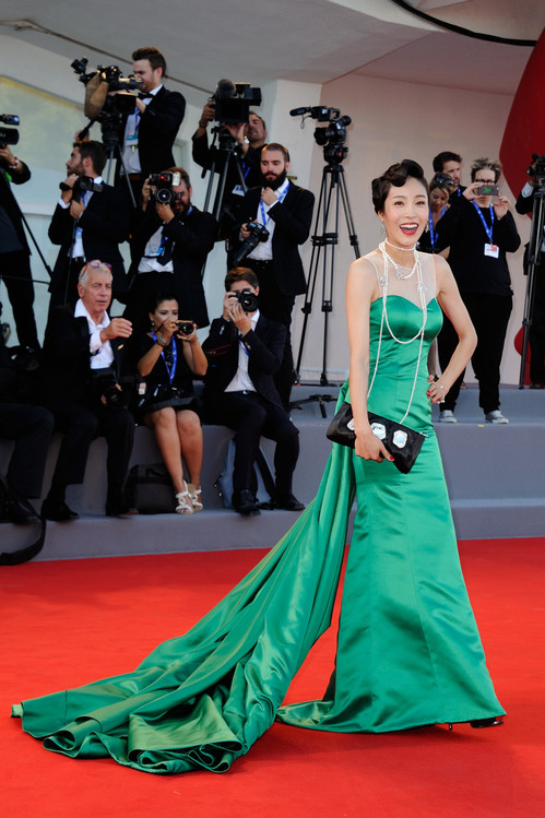 Jing Ke poses after she fell on the red carpet during the 'The Light Between Oceans' Premiere on the Lido in Venice, Italy as part of the 73rd Mostra, Venice International Film Festival on September 01, 2016. Photo by Aurore Marechal/ABACAPRESS.COM