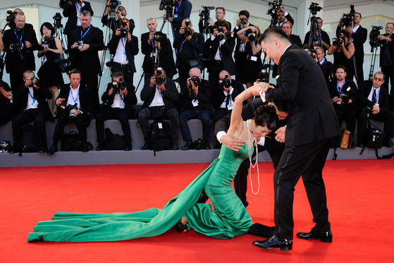 Jing Ke falls on the red carpet during the 'The Light Between Oceans' Premiere on the Lido in Venice, Italy as part of the 73rd Mostra, Venice International Film Festival on September 01, 2016. Photo by Aurore Marechal/ABACAPRESS.COM