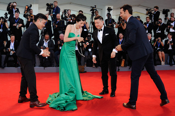 Jing Ke poses after she fell on the red carpet during the 'The Light Between Oceans' Premiere on the Lido in Venice, Italy as part of the 73rd Mostra, Venice International Film Festival on September 01, 2016. Photo by Aurore Marechal/ABACAPRESS.COM