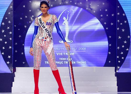 Miss Dominican Republic Marianne Cruz strikes a pose in a costume reflecting her native country during the National Costume Show in Lions Theater, in Ho Chi Minh City.