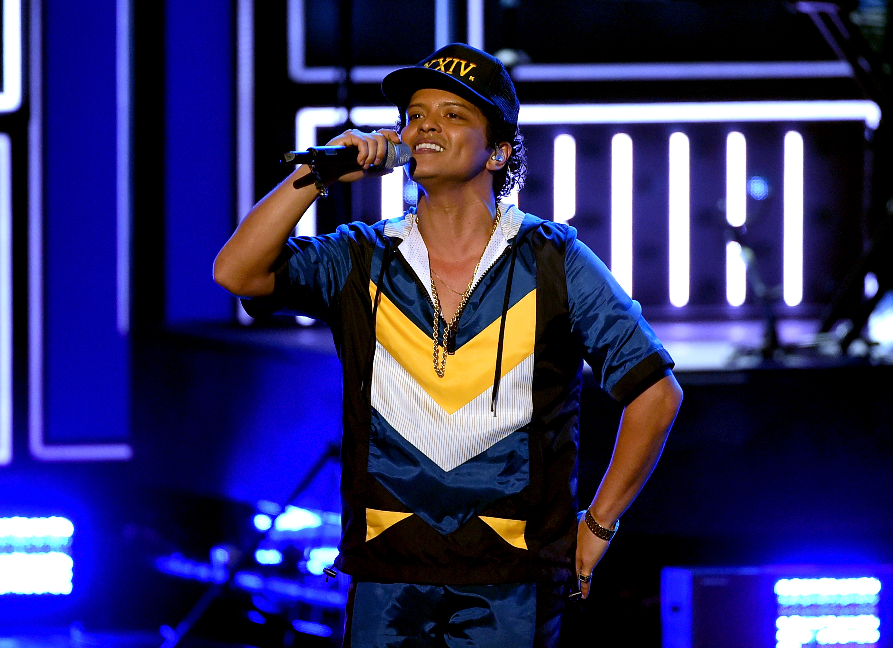 LOS ANGELES, CA - NOVEMBER 20: Singer Bruno Mars performs onstage during the 2016 American Music Awards at Microsoft Theater on November 20, 2016 in Los Angeles, California. Kevin Winter/Getty Images/AFP