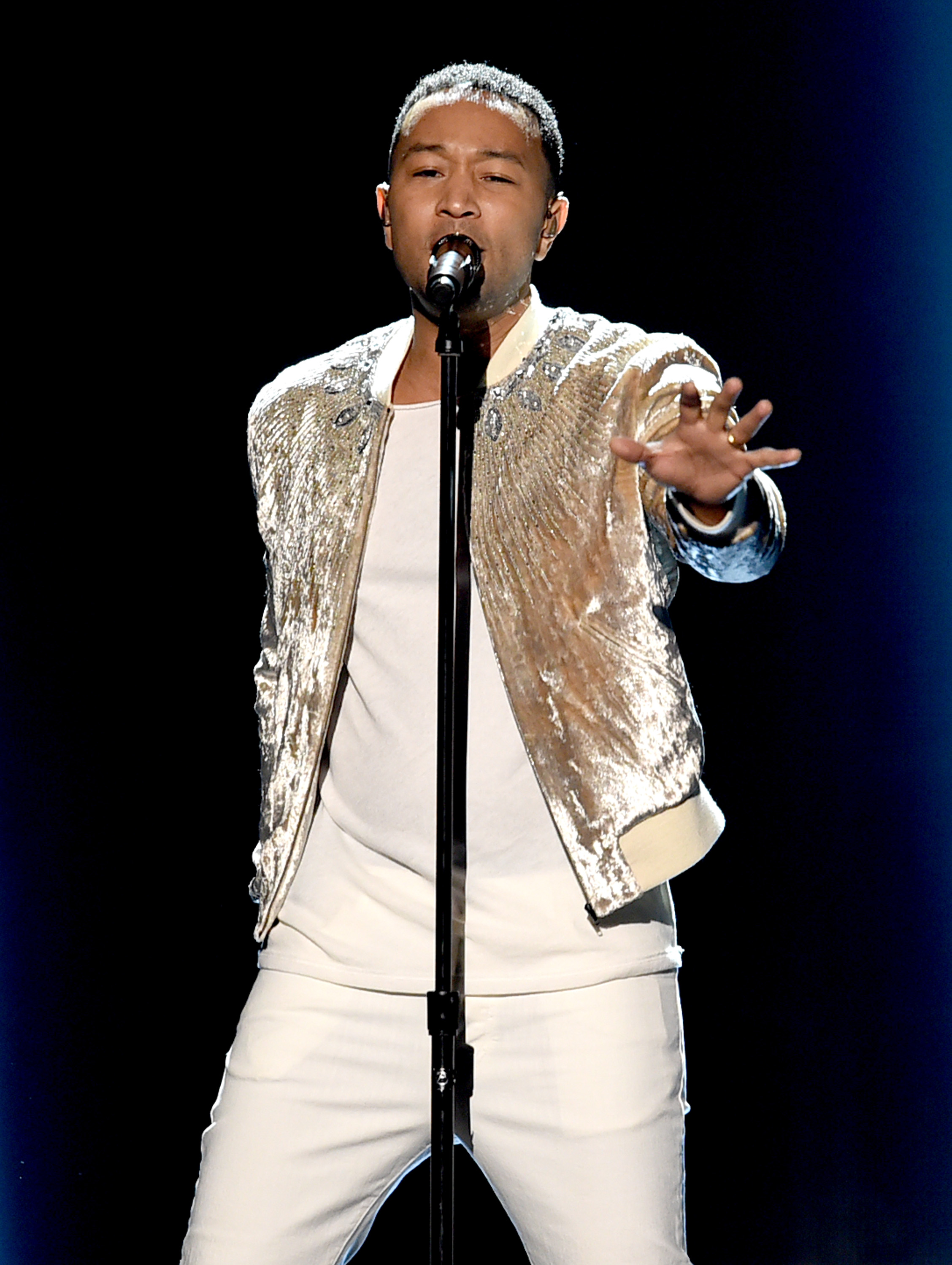 LOS ANGELES, CA - NOVEMBER 20: Singer John Legend performs onstage during the 2016 American Music Awards at Microsoft Theater on November 20, 2016 in Los Angeles, California. Kevin Winter/Getty Images/AFP