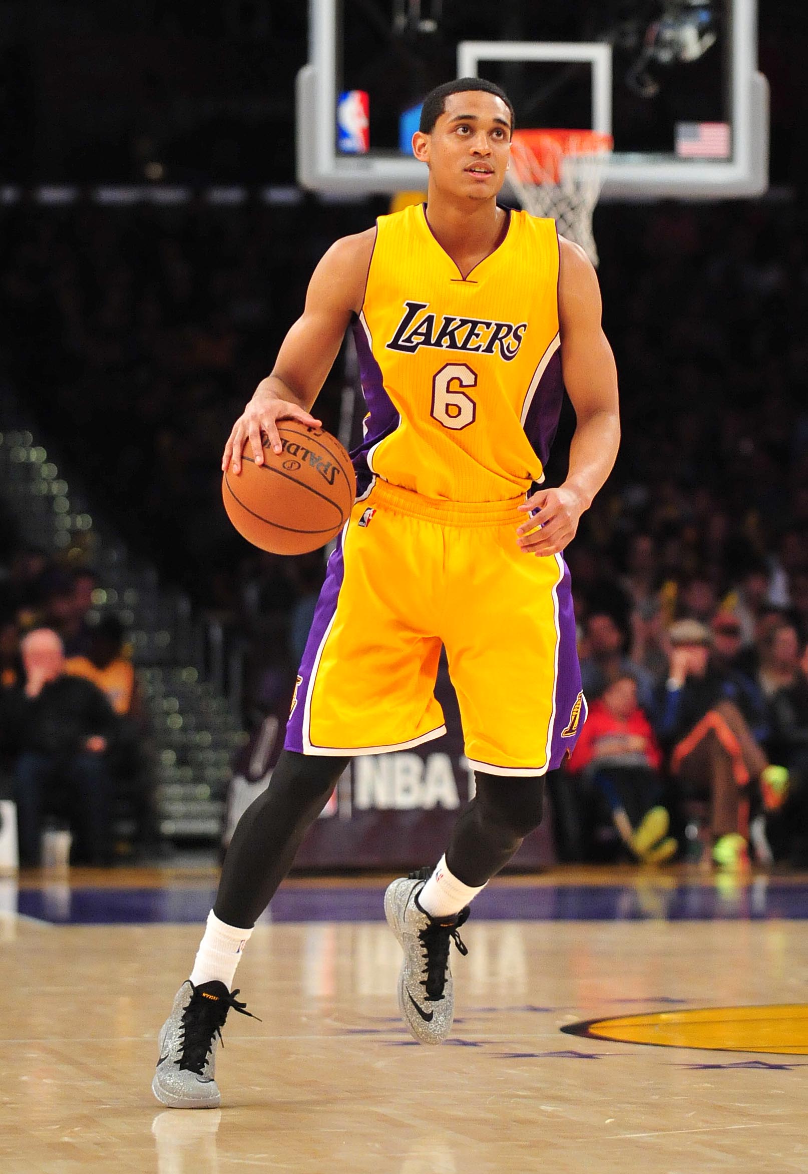 April 3, 2015; Los Angeles, CA, USA; Los Angeles Lakers guard Jordan Clarkson (6) moves the ball up court against the Portland Trail Blazers during the second half at Staples Center. Mandatory Credit: Gary A. Vasquez-USA TODAY Sports