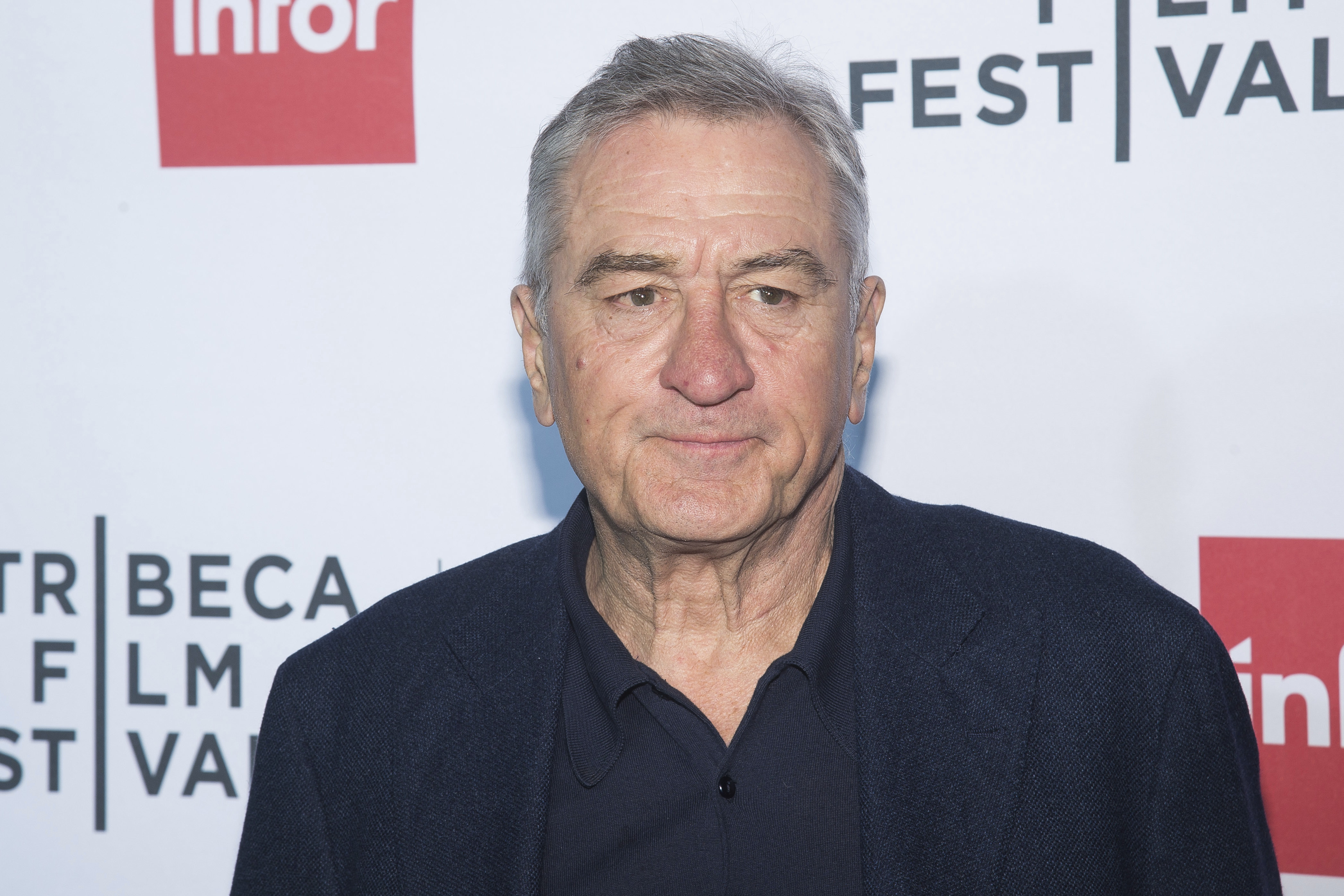 FILE - In this April 21, 2016 file photo, Robert De Niro attends a special 40th anniversary screening of "Taxi Driver" during the 2016 Tribeca Film Festival in New York. The 2016 election has provoked a visceral, intense response from many in the arts community, prompting songs, videos and uncommon ferocity against Trump, arguably once one of their own. De Niro called Trump “a dog,” “a pig,” “an idiot” and “a mutt, who doesn’t know what he’s talking about.” (Photo by Charles Sykes/Invision/AP, File)